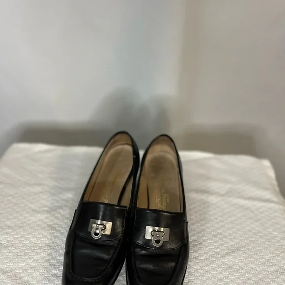 Salvatore Ferragamo Black Loafer Flats with silver logo hardware. Corpcore